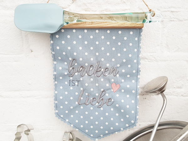 Backen ist Liebe Spruch - Stickdatei